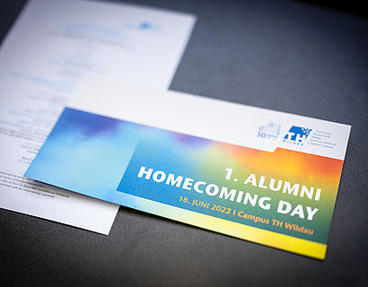 Bild der Save-the-Date-Karte für den Alumni Homecoming Day 2022
