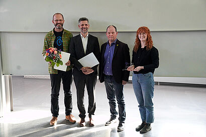 In diesem Bild sind die Preisträger "NUDAFA" von dem  FuT Preis 2026 zu sehen. 