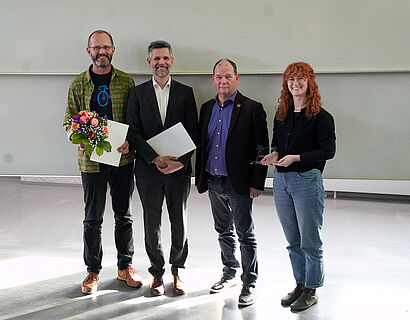 In diesem Bild sind die Preisträger "NUDAFA" von dem  FuT Preis 2026 zu sehen. 