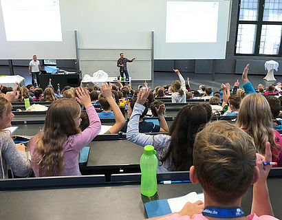 Foto von Kindern im Audimax