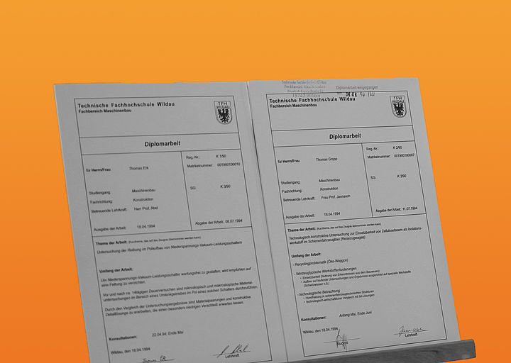Abschlussarbeiten Bild Abschlussarbeiten auf orangenem Hintergrund
